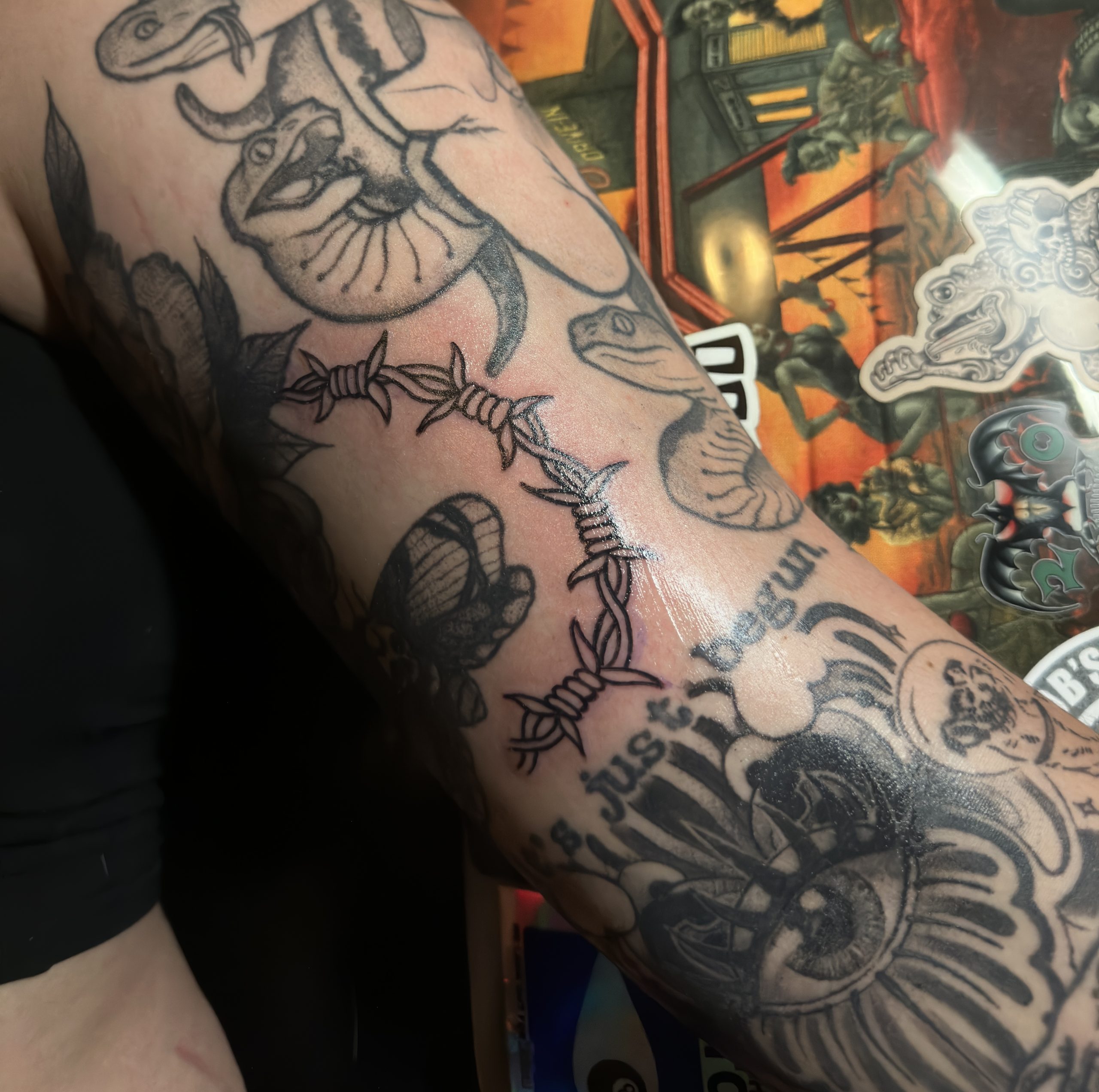 Barbed wire tattooed on a client fir gap filler
